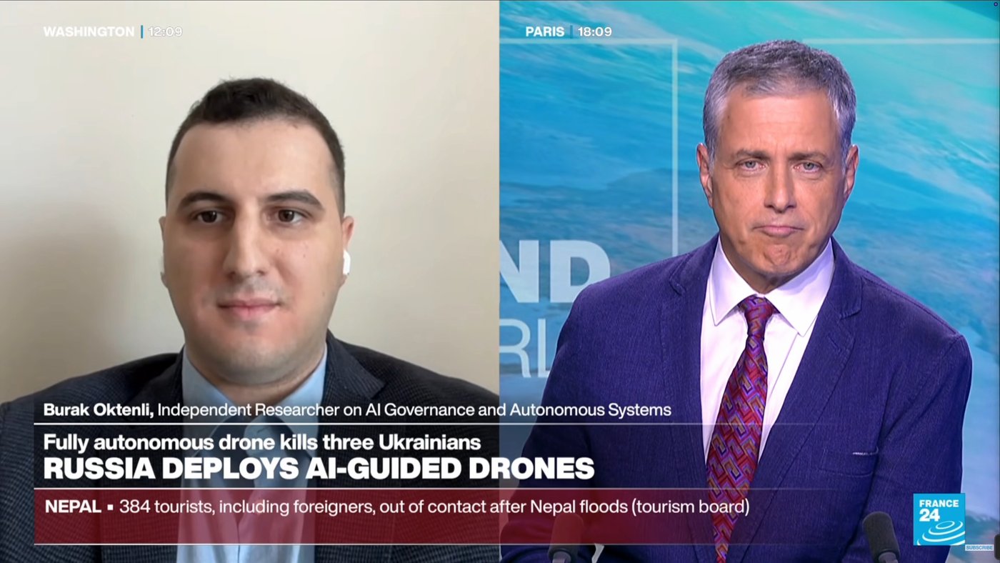 Burak Oktenli appearing live from Washington on France 24 English, identified on screen as Independent Researcher on AI Governance and Autonomous Systems, alongside the studio anchor in Paris